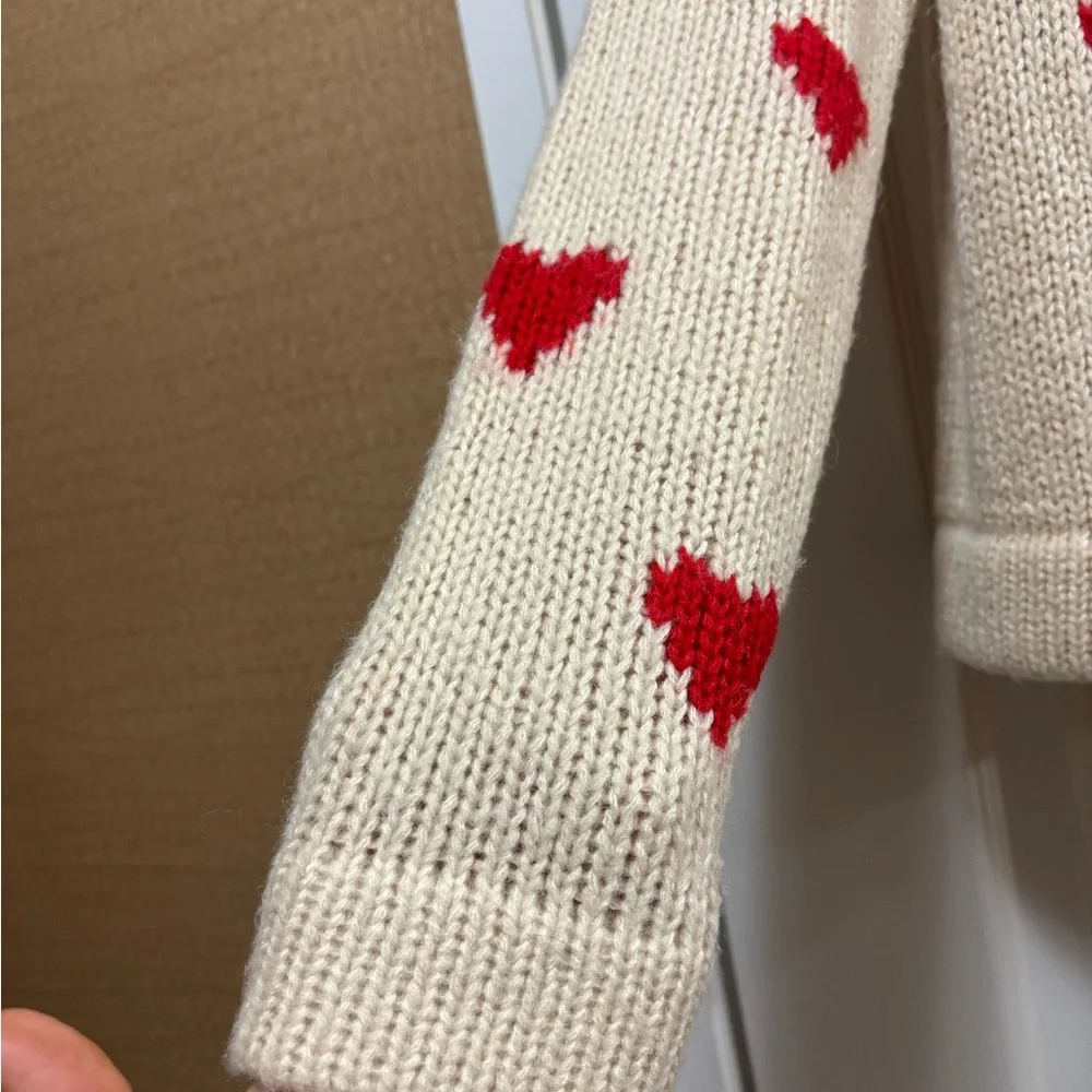 THE GREAT. Cream Cardigan with Red Heart Accents - Picture 12 of 16